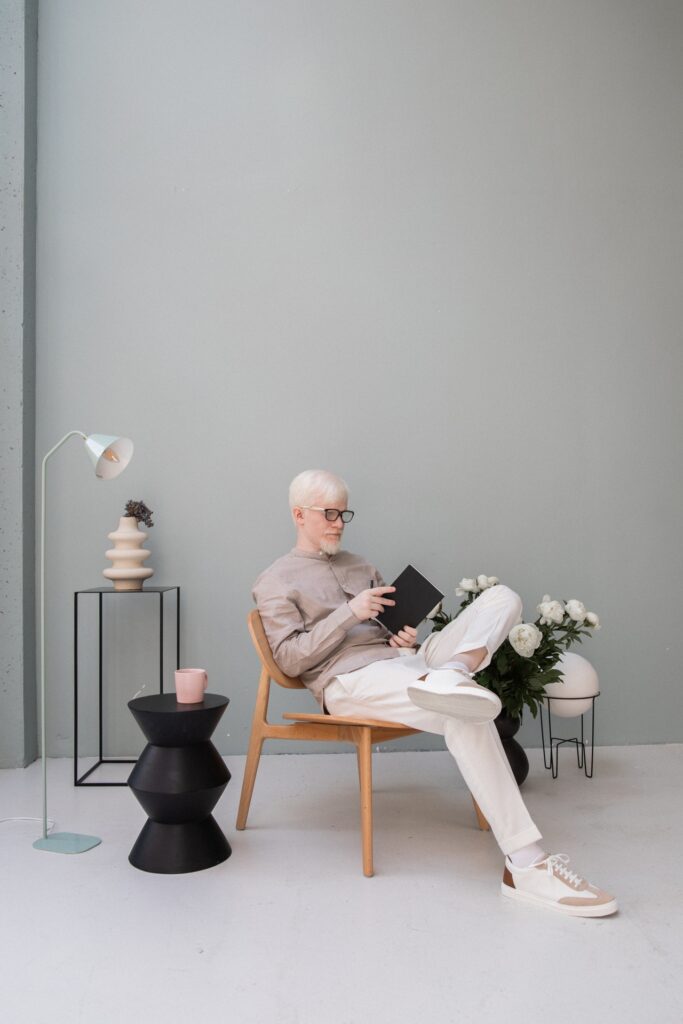 An older white haired man reads a book in a stylish living space. This could represent the peace acheivied after addressing erectile dysfunction in Cincinnati, OH. Our team offers erectile dysfunction treatment in Indiana and other services. Learn more about erectile dysfunction treatment in Kentucky and more! 45208