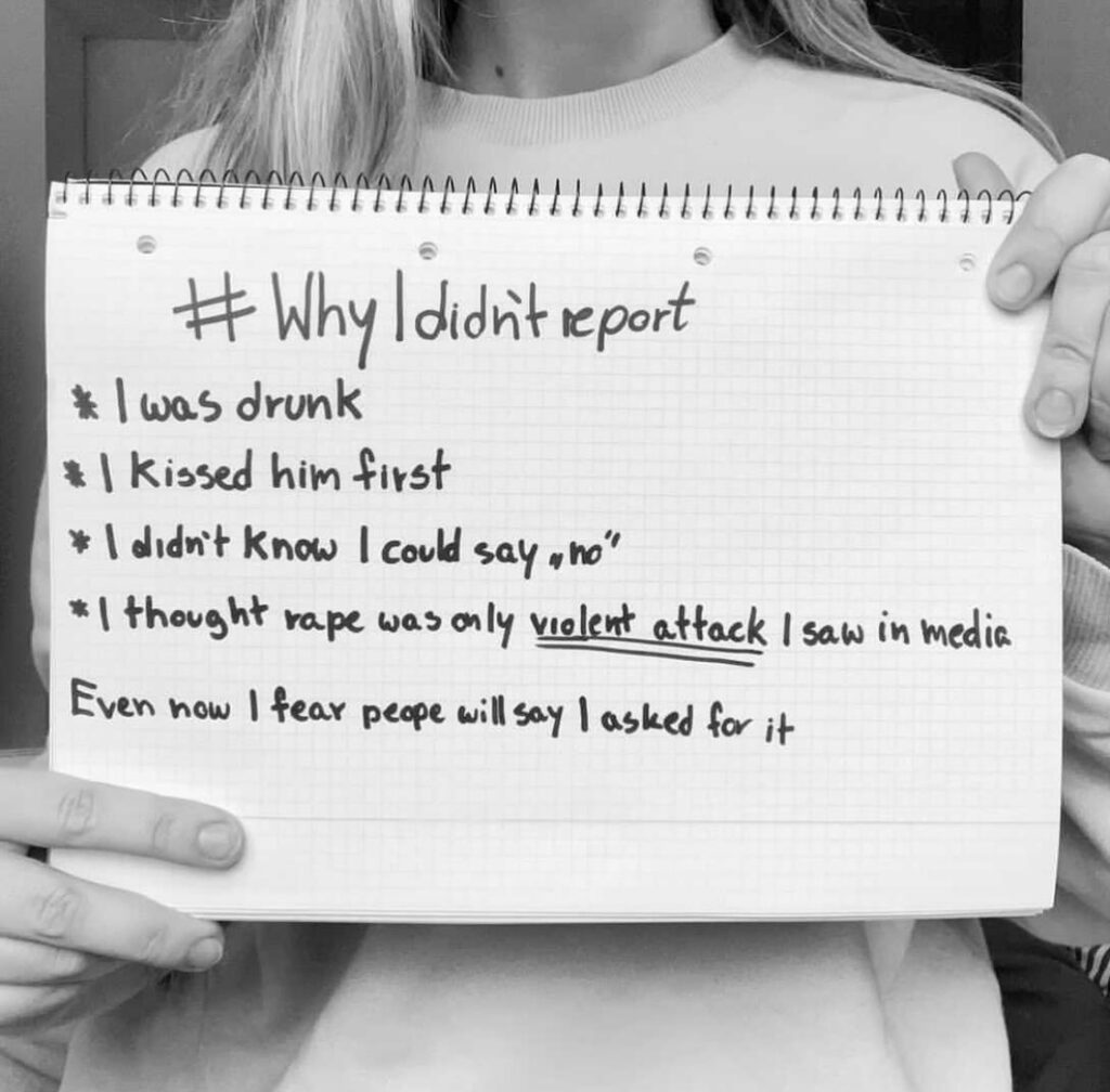 photo of a woman holding a sign that says #why I didn't report. I was drunk. I kissed him first. I didn't know I could say no. I thought rape was only a violent attack I saw in the media. Even now I fear people will say I asked for it." This represents the struggles many sexual assault survivors face when reporting what happened. consider getting support for sexual trauma in cincinnati, OH at Emma schmidt and associates. 